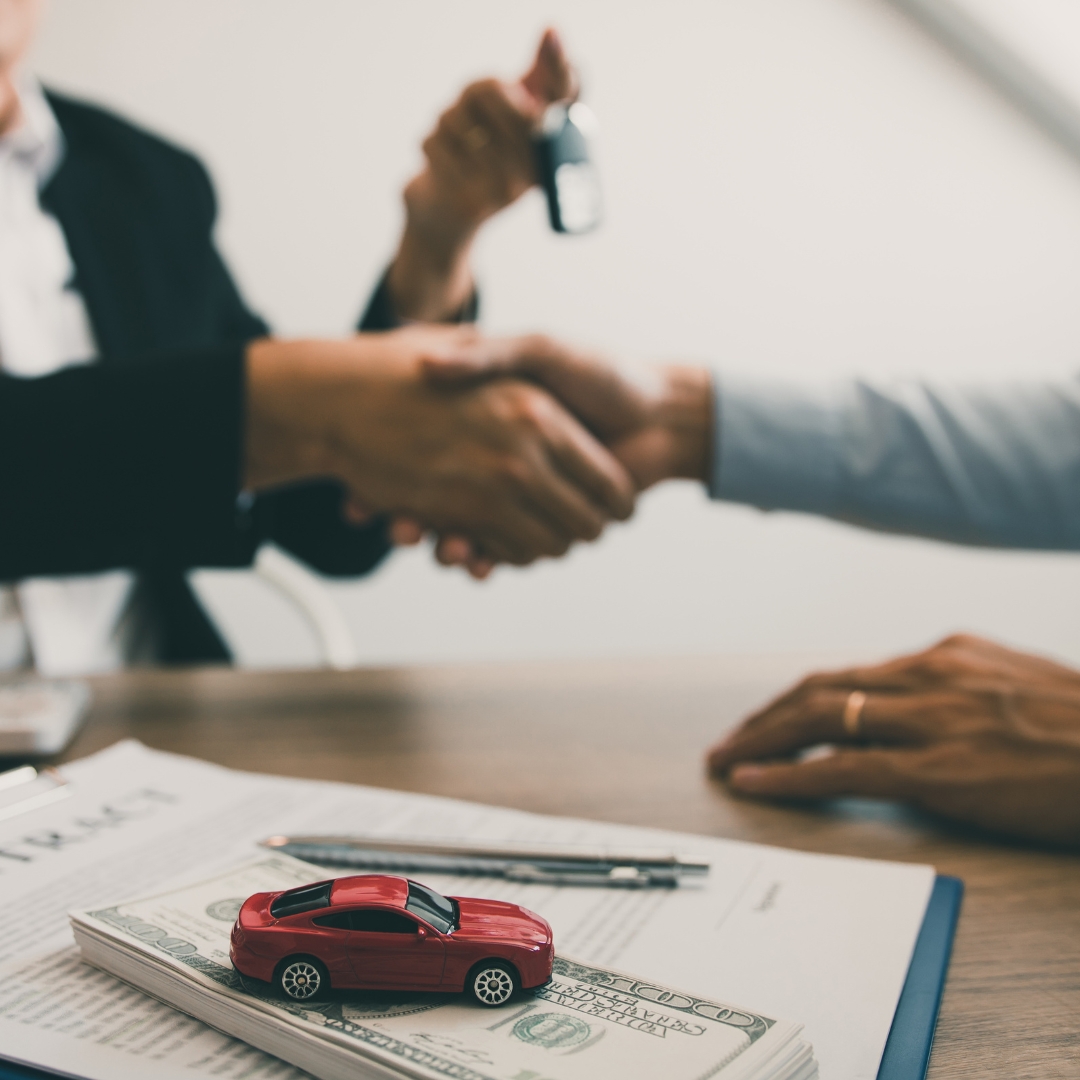 Agent and customer signing an auto warranty policy